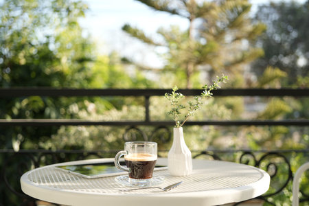 Coffee break at cozy balcony, minimalistic lifestyleの写真素材