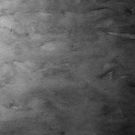 Dark gradient grey grunge paper texture with stainsの写真素材