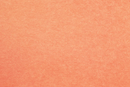 gradient Orange paper texture background with grains surfaceの写真素材