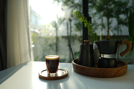 Coffee and moka pot set, under morning sunlightの写真素材
