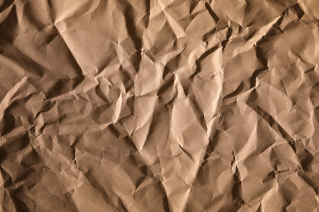 Dark brown crumpled paper textureの写真素材
