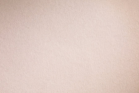 Old weathered paper texture with visible crease in the middleの写真素材