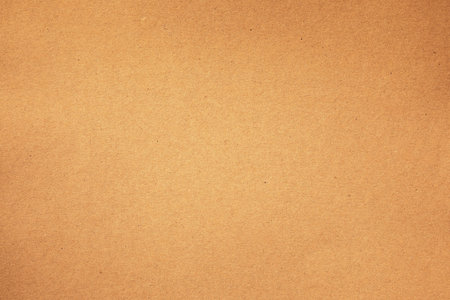 Macro closeup up of kraft brown paper with visible scratches grungeの写真素材