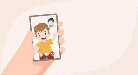a hand holding cell phone a boy video call social online to connect together with a asian friend from distancing place illustration vector and wording space banner.のイラスト素材