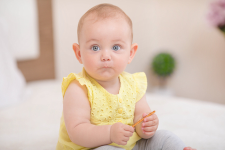 Baby is sleeping in bedの写真素材