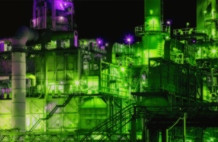 Scenic of oil refinery plant shines at night in green and purple tones. Lens Blur filter.の写真素材