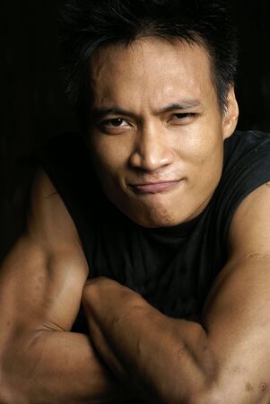 Strong asian man portrait の写真素材