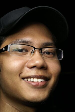 Smiling asian man portraitの写真素材