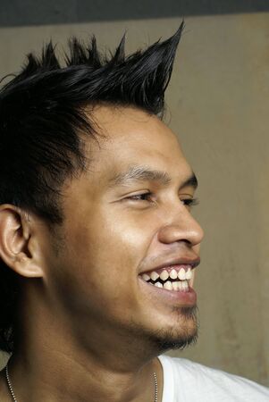 Happy asian punk portrait の写真素材