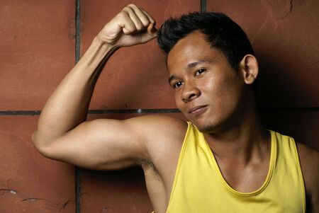 Fit young asian man