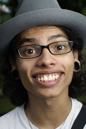 Happy asian man with hatの写真素材
