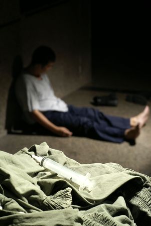 Syringe and homeless drug addictの写真素材