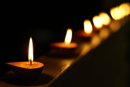 Indian candles in a rowの写真素材