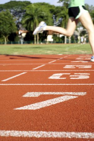Sports track numbers and runnerの写真素材