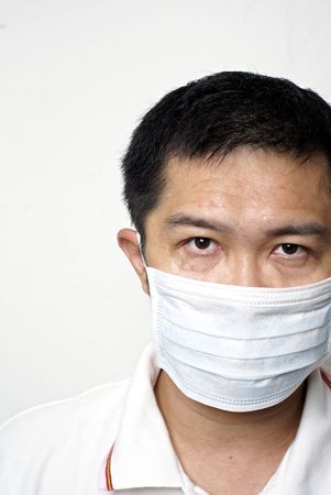 Asian man in medical mask portraitの写真素材