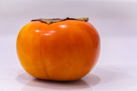 YELLOW ORANGE FRUIT WITH WHITE BACKGROUND 1の写真素材