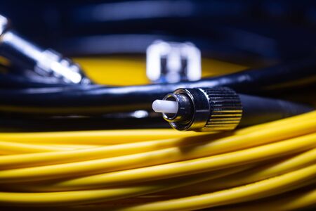 FC CONNECTOR YELLOW OFC PATCH CORD FERRULE CONNECTOR IN BLACK BACKGROUND TELE COMMUNICATION 2