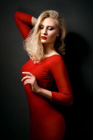 very beautiful blonde woman with well-groomed skin feminine look and perfect makeupの写真素材