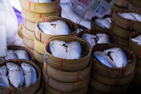 mackerel in bamboo basket in Thailandの写真素材