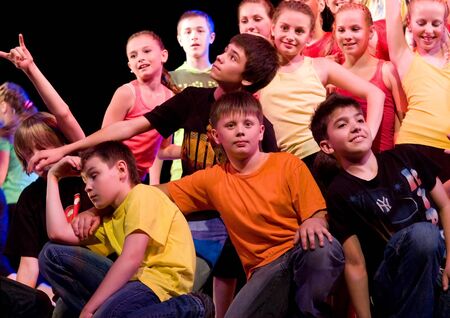 SCHOOL-THEATRE OF MODERN DANCE POTOKI,DNEPROPETROVSK, UKRAINE -June 2, 2011. Summer Entertainment City Windows.Teenagers class dancers perform composition Street movements on a stage of a local theatre.のeditorial素材