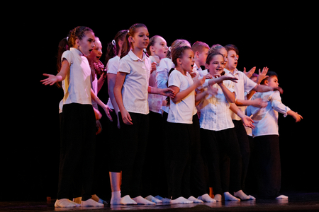 DNEPROPETROVSK,UKRAINE - December 13, 2014 - School-theater of Contemporary dance POTOKI, Dnepropetrovsk Teens class dancers perform a composition "Let the sun in"のeditorial素材
