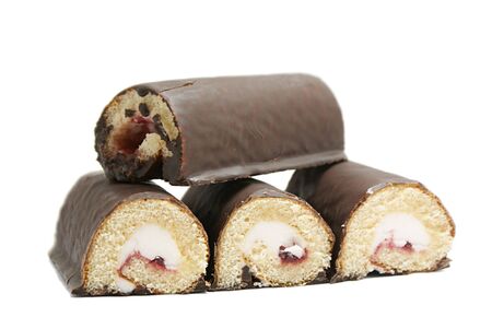 Chocolate rolls with cream isolated on white background の写真素材