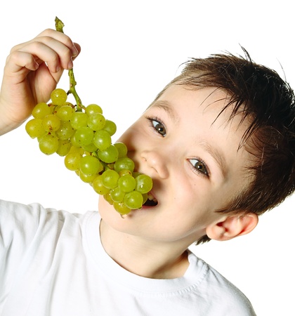 Boy with grapesの写真素材