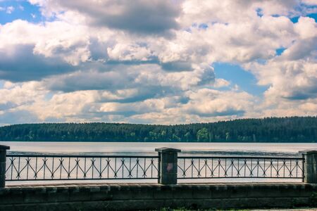 Quiet lake in the forest by the light of the setting sun. Russian landscape.の写真素材