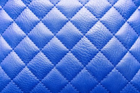 Abstract background texture of an old natural luxury modern style leather with rhombs. Classic white, violet and purple grungy leather of retro wall, door, sofa or studio interior.の写真素材