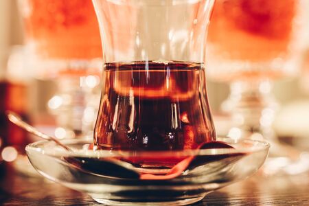 Cup of turkish tea served in traditional style. Beautiful tea ceremony concept.の写真素材