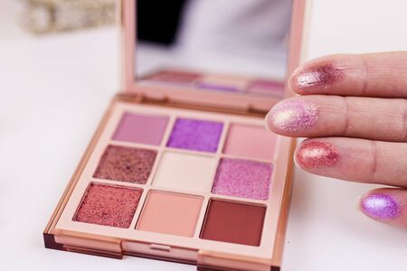 Eye shadow swatches on woman hand. Decorative cosmetics.の写真素材