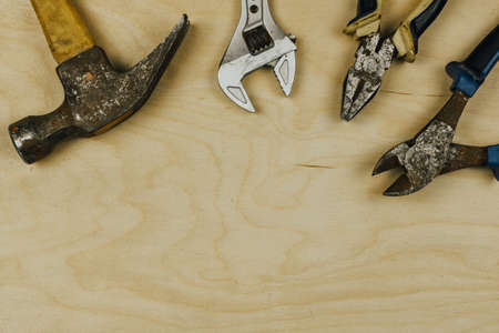 Toolbox with rusty equipments on the table. Used, old work tools concept. View from above.の写真素材