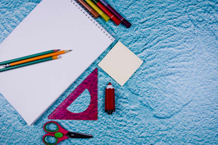 Background with notebook and school supplies.pencil, scissors, ruler, pencil sharpener.の写真素材