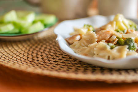 Chicken pasta with mushroom and cream cheese. Close up view with blurred background.の写真素材