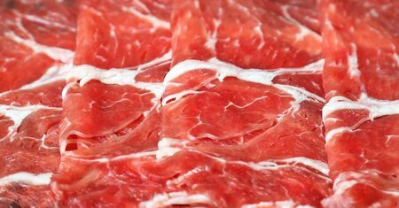 Close up of Fresh sliced raw beefの写真素材