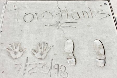 LOS ANGELES - MAY 18:Hand and Footprints of Tom Hanks at Graumann s Chinese Theater from 1998, the year he was nominated best actor from The Academy Awards, in Los Angeles, California on May 18, 2009.のeditorial素材