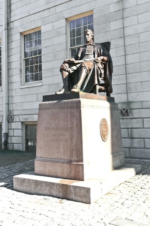 John Harvard statue. Tourists rub his left shoe for luckのeditorial素材