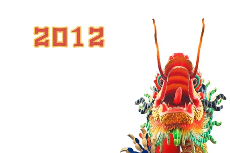 Close up of chinese style dragon head statue isolated on white backgroundの写真素材