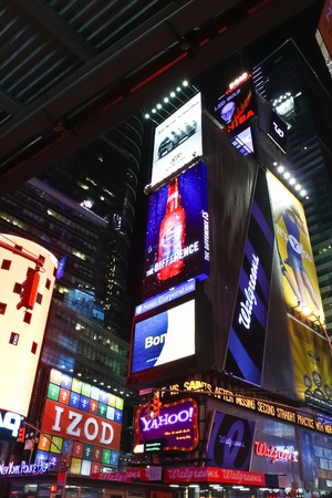NEW YORK CITY - JAN 23: Times Square, a busy tourist intersection, featured with Broadway Theaters and animated LED signs is a symbol of New York City and the United States on January 23, 2010 in Manhattan, New York City. のeditorial素材