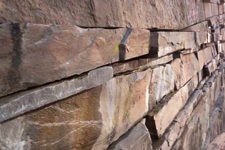 Natural slate stone wall backgroundの写真素材
