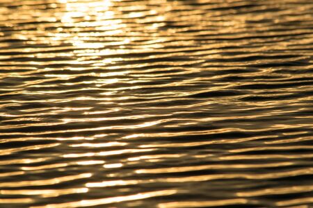 Sunset light water textureの写真素材