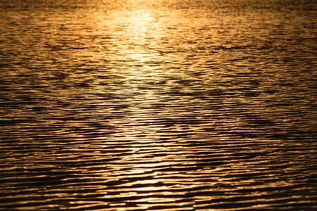 Sunset light water textureの写真素材