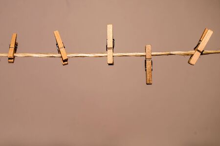 Pins on a brown background.