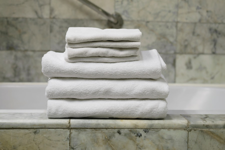 Stack of the white towel on marbleの写真素材