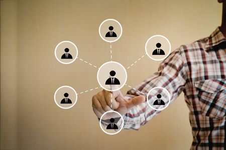 A man pressing social network button on digital display.の写真素材