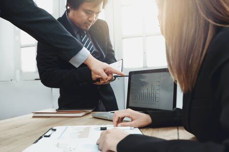 Business men and women are negotiating about planning, marketing analysis.