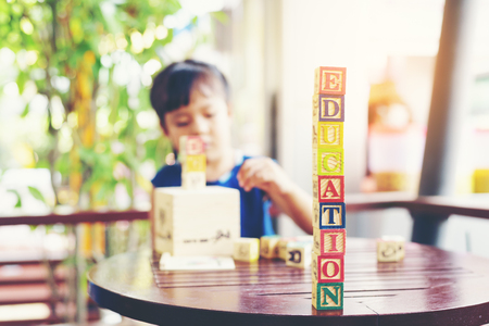 Little girl  palying with wooden cubes ,Educational Learning Conceptsaの写真素材