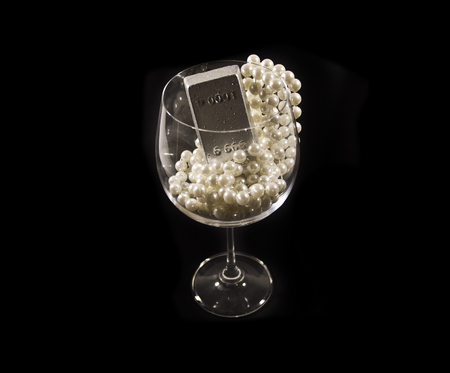 diamond and pearls isolated on a black backgroundの写真素材