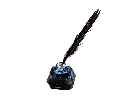 inkpot with feather isolated on white backgroundの写真素材