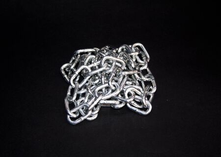 chain isolated on a black backgroundの写真素材